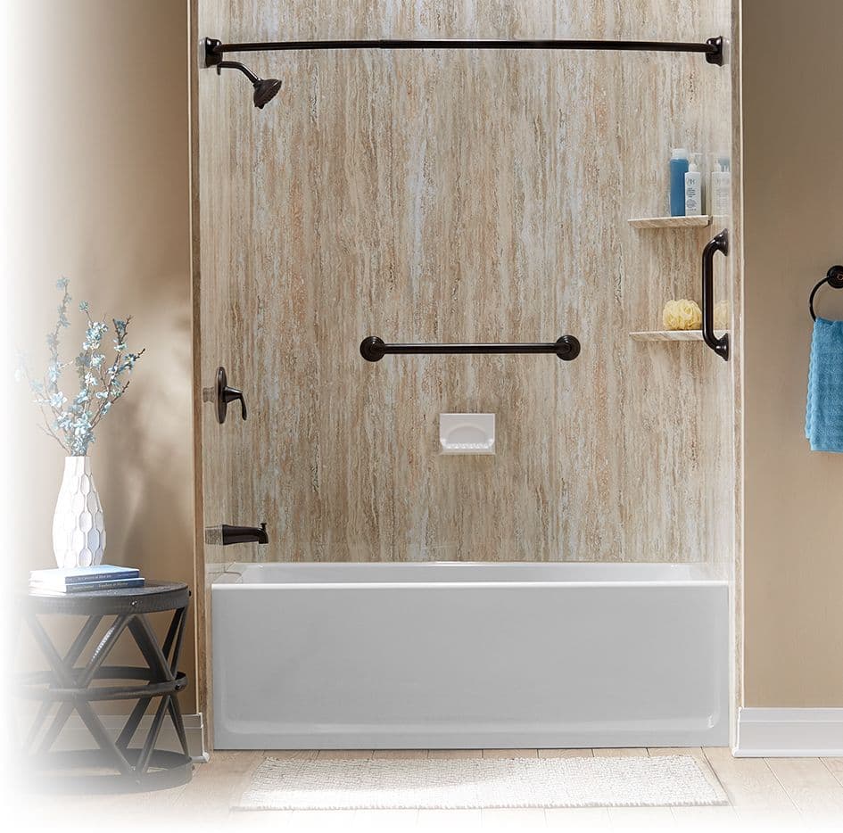 A replacement bathtub with black fixtures and grab bar.